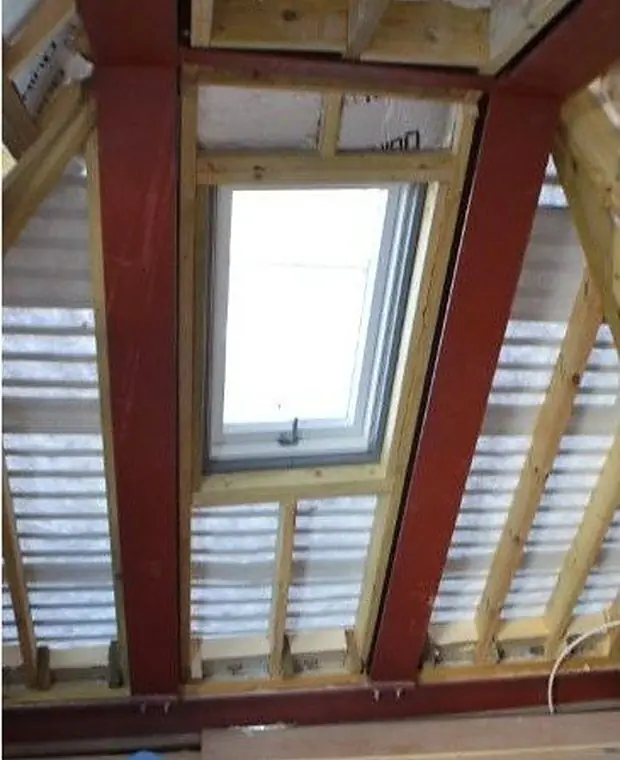 Loft conversion in progress with new roof windows