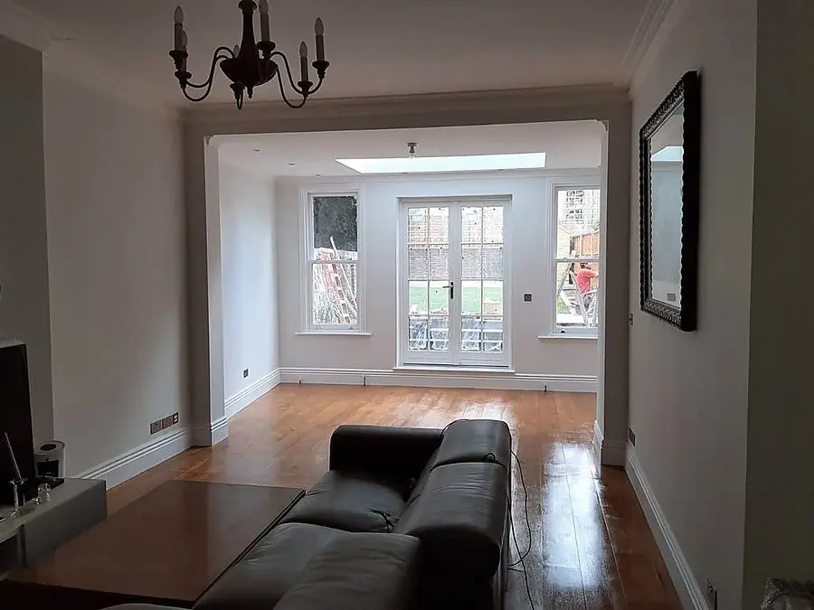 A reception room opening onto the garden, by Ogival in Maida Vale