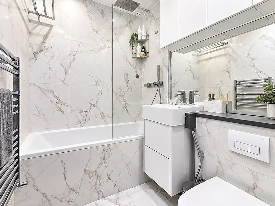 A marble bathroom by Ogival in Shepherd&rsquo;s Bush