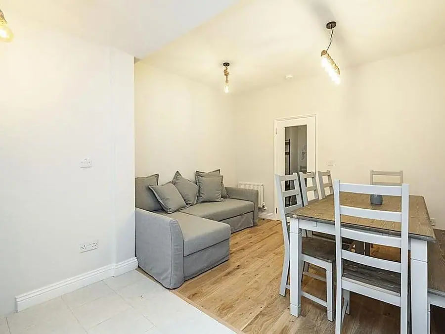 A finished living and dining room by Ogival in White City