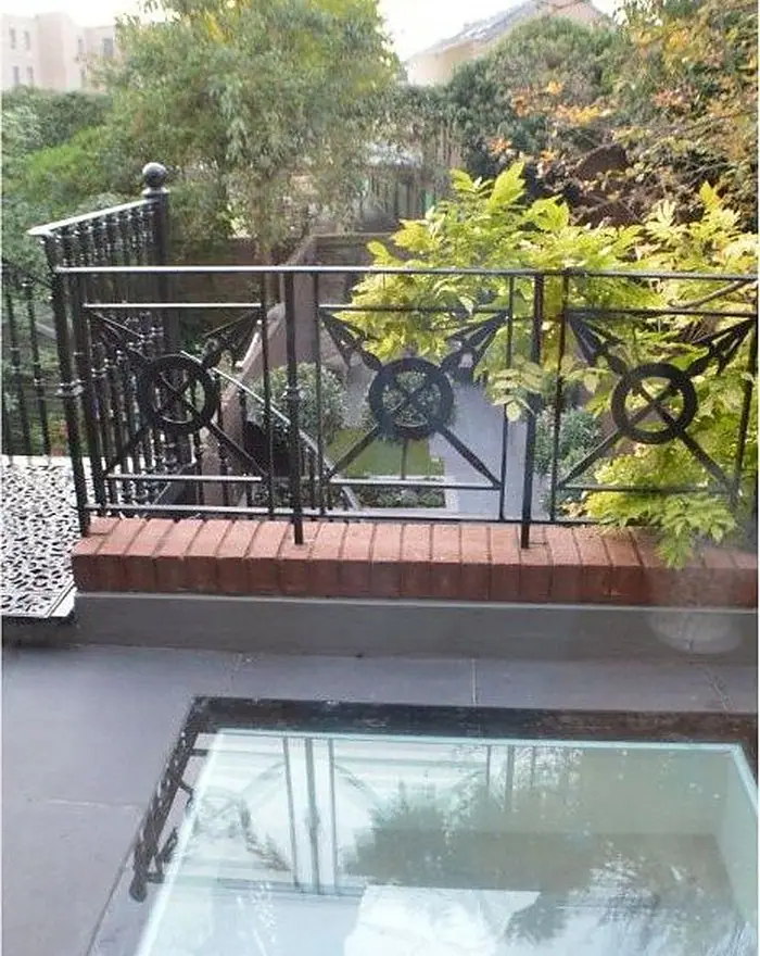 Restored balcony railings by Ogival